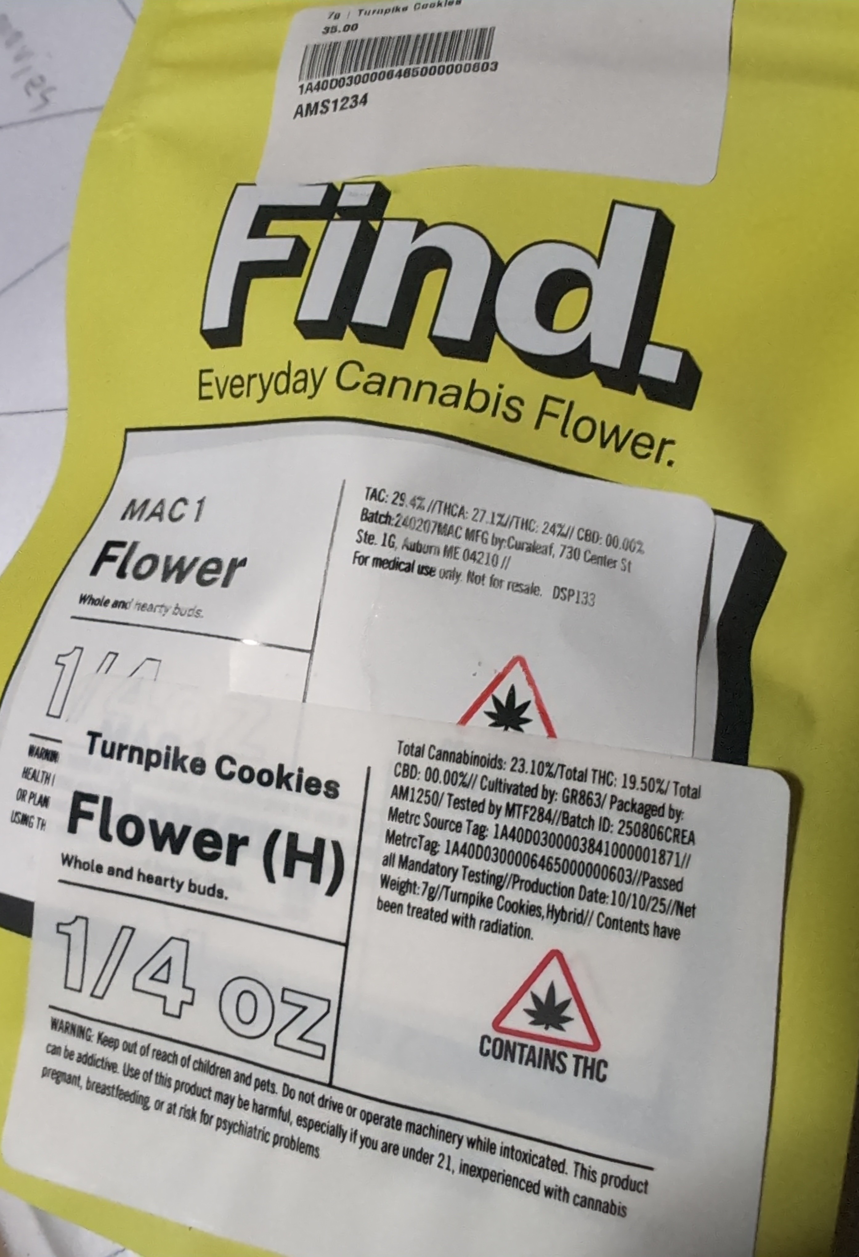 Medical label with adult-use sticker placed over it